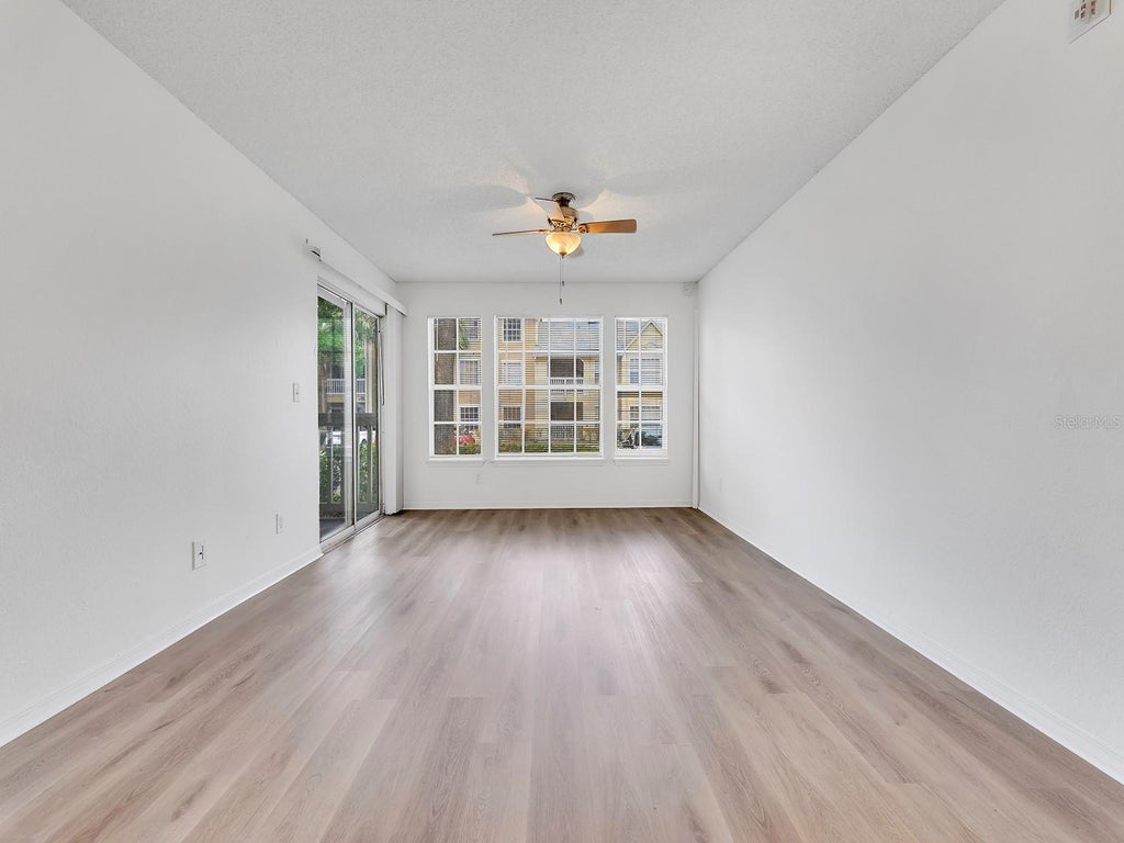 Photo of 1081 S Hiawassee Road #715, Orlando, FL 32835 (MLS # O6438989)