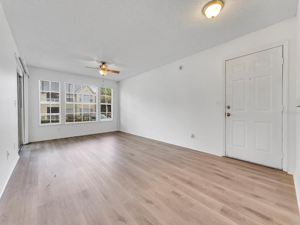 Photo of 1081 S Hiawassee Road #715, Orlando, FL 32835 (MLS # O6438989)
