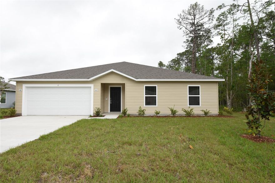 Outlined by the serene beauty of Palm Coast, 6 Lleberry Path offers an inviting haven brimming with comfort and style. This charming 4-bedroom residence is a seamless blend of modern design and cozy warmth, promising an exceptional living experience. Spanning across 1867 sq ft, the home provides ample space for relaxation, entertainment, and everything in between. Step inside to discover the thoughtful layout, where every corner is designed to enhance your lifestyle. The two full bathrooms are elegantly appointed, offering convenience and a touch of luxury to daily routines. Natural light cascades through the windows, highlighting the spaciousness and enhancing the welcoming atmosphere. The property's location in Palm Coast offers a perfect balance of tranquility and accessibility, promising a peaceful retreat without being far from the city's amenities. Whether you're enjoying a quiet evening at home or hosting friends and family, this residence adapts to your every need. Discover the vibrant lifestyle that awaits you at 6 Lleberry Path, where every day feels like a getaway.