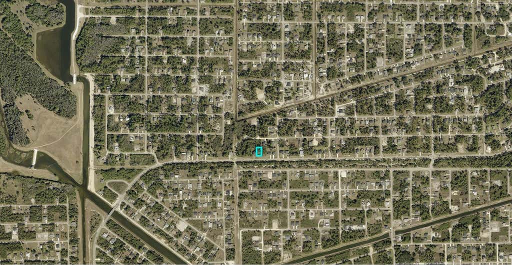 Photo of 3149 Sunshine Boulevard, Lehigh Acres, FL 33971 (MLS # A4697601)