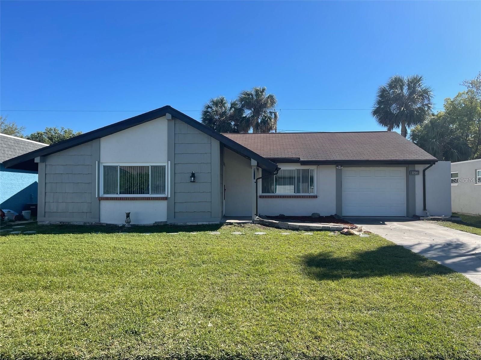 Come explore this beautifully updated 2-bedroom, 2-bathroom home with a bonus room—perfect for an office, den, or even a third bedroom, a spacious 1 car garage and a sunny florida room. Built in 1971, this 1,232 sq ft home has been completely renovated and features: Hurricane-impact windows, brand new roof, new water heater, freshly paint inside and out. Enjoy cozy, functional living in a home that’s move-in ready and ideal for those seeking comfort and peace of mind. Close to shopping, dining, entertainment, and major highways—giving you easy access to everything that Pasco has. Rental Requirements: No application fee, No evictions or convictions. No smoking allowed inside. Must show 3x rent in combined monthly income. Lower credit scores considered on a case-by-case basis. Move-in requires first month, last month, and security deposit (each equal to one month’s rent). One small pet under 15 lbs allowed. Top-rated management in place – Apply today and secure your new home! Don’t miss your chance—call now to schedule a showing!