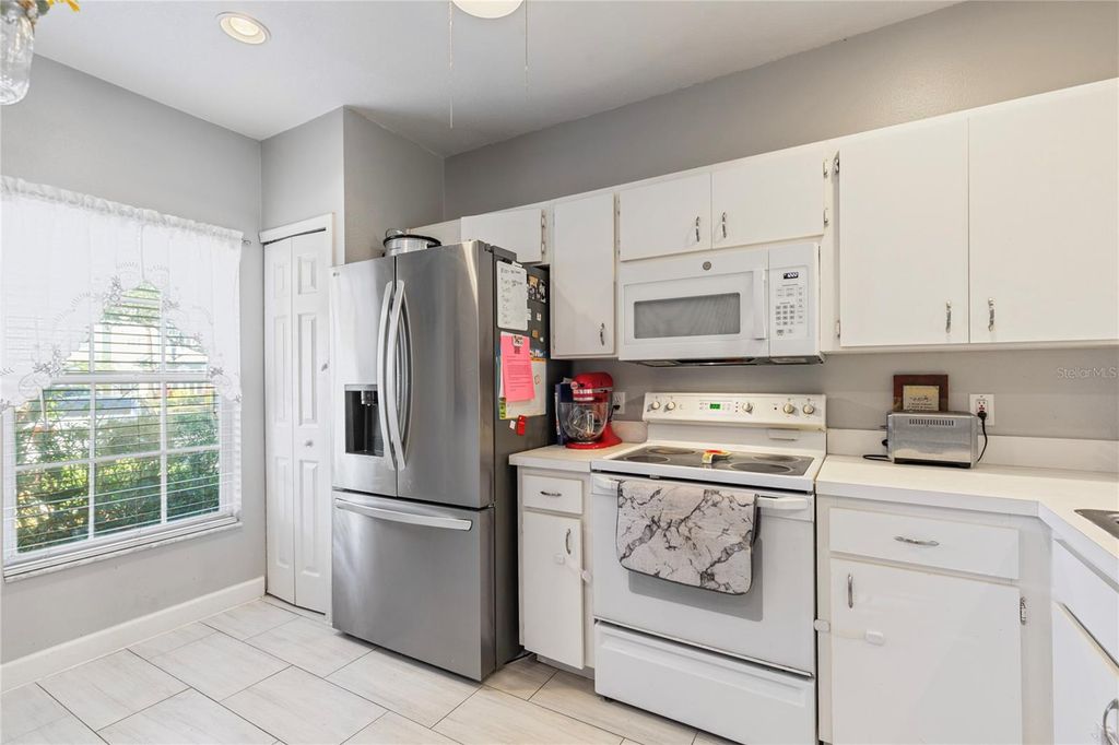 Photo of 291 Countryside Key Boulevard, Oldsmar, FL 34677 (MLS # TB8463435)