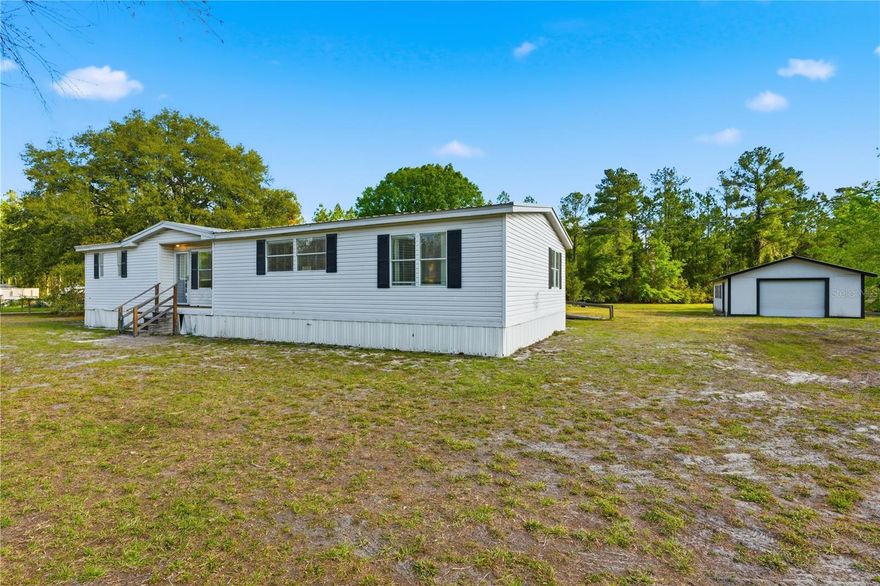 One or more photo(s) has been virtually staged. Priced to move! This 3BR/2BA home on a full 1-acre homesite offers a rare opportunity for buyers looking to add value and make it their own. Priced to sell with room to spare for upgrades and your personal touches. This 3BR/2BA home offers approx. 1,736 sq ft with a desirable split-bedroom layout, walk-in closets, and spacious living/dining area. The kitchen features an island and abundant cabinet storage. This home has a split-bedroom layout, walk-in closets, and a spacious living/dining area, and has a solid layout ready for updates and personal touches.

Included is a detached 32x20 garage/workshop on a concrete slab plus additional storage/pump house offer great functionality. This one acre parcel is completely fenced with gates and lots of room for pets, projects, or outdoor enjoyment.

Major system updates include a roof replaced in 2016, a newer 2021 HVAC unit, and a 200-amp electrical service upgrade costing $8,000 and installed in 2024 providing added efficiency and peace of mind.

Conveniently located just minutes from Starke with lots of shopping and great eateries. Easy access to Gainesville and surrounding areas, this property offers a blend of privacy and accessibility. Add your fresh updates and finishing touches and this home has the potential to truly shine.

Schedule your private showing today!