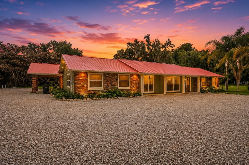 Photo of 2072 Lake Ariana Boulevard, Auburndale, FL 33823 (MLS # L4962862)