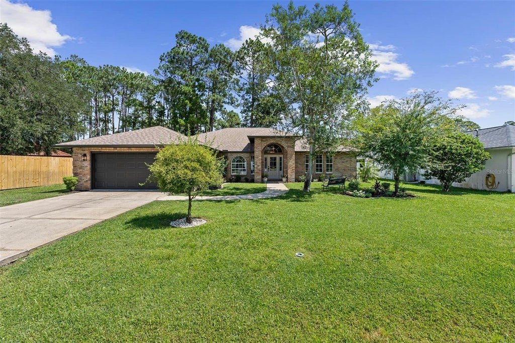 Photo of 173 Bayside Drive, Palm Coast, FL 32137 (MLS # FC321090)
