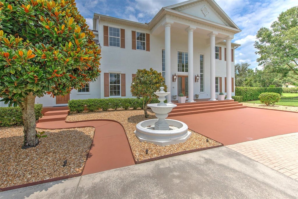 Photo of 11444 Hammock Oaks Ct, Lithia, FL 33547 (MLS # TB8526510)