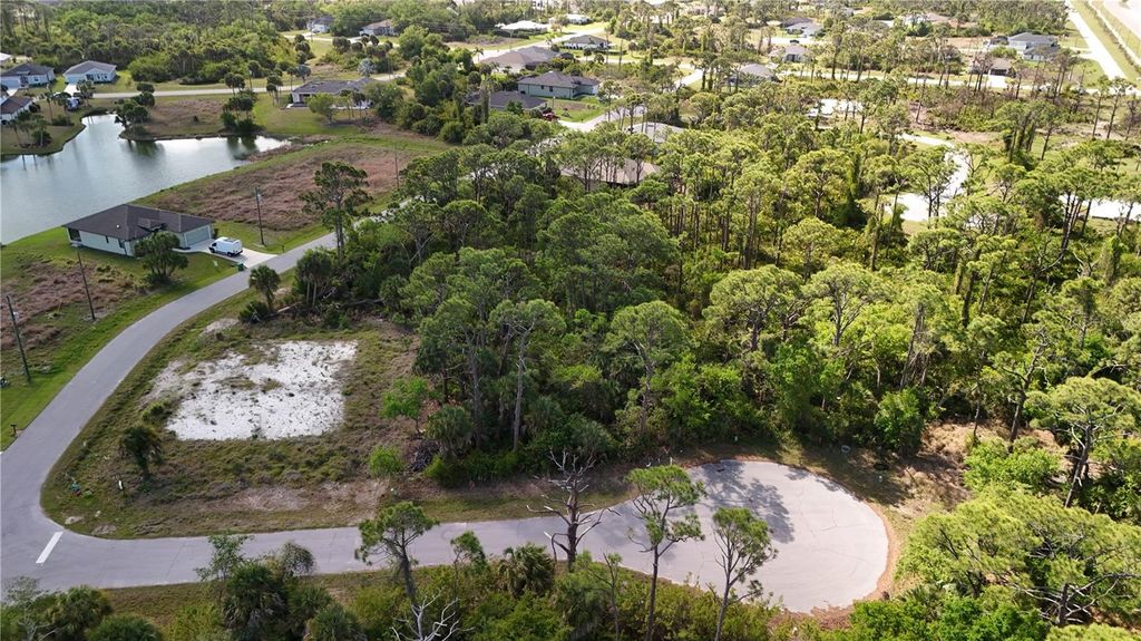 Photo of 103 Hawk Drive, Rotonda West, FL 33947 (MLS # D6146836)