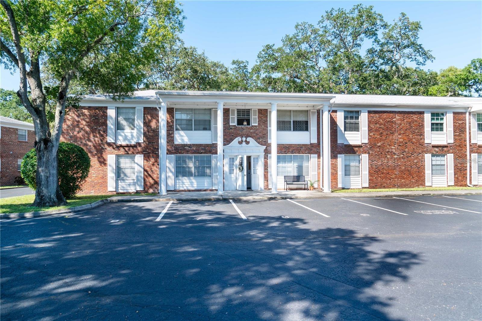 Owner Motivated!! WOW! Beautifully updated and well maintained 2 bedrooms/1-bathroom non-age restricted condo in small, friendly community of only 44 units nestled among mature trees on a dead-end street in West Bradenton! The kitchen boasts updated cabinets, stone countertops, backsplash and updated appliances! Large, enclosed lanai! There is a large outdoor open patio perfect for al fresco dining! Flood insurance is included in monthly fee! Community pool and clubhouse on site. Tile flooring throughout this home with an updated bathroom! Assigned parking! This is one of the lowest priced 2 bedroom updated condo in Bradenton! Hurry, don't miss this one!