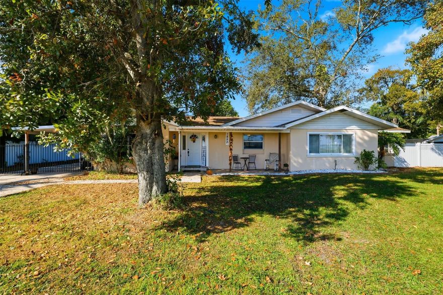 You've found the one!  This 4-bedroom, 2-bathroom POOL home is RIGHT ACROSS THE STREET FROM LAKE PARKER with recreational access!  Step inside to find all new flooring throughout.  Desirable split floorplan with owner's retreat located on one side of the home, with ensuite bath and laundry.  Kitchen features: Stainless Appliance Package including a Double-Oven Range, white cabinetry, beautiful backsplash & a pantry.  Family/Dining room area leads to the other three spacious bedrooms and secondary bath.  New Flooring Throughout!  Step outside to your backyard oasis, complete with a Screened and Covered Pool area - great for entertaining. A storage shed rounds out the outdoor space and gives you plenty of room for storing your new pool toys.  Other features: Roof 2018, Double Pane Windows, 2nd living room or flex space with sliders out to the pool area, front covered porch, carport. Beautiful large lot and this location offers easy access to Downtown Lakeland, I-4, shopping, medical centers, parks, dining and entertainment.