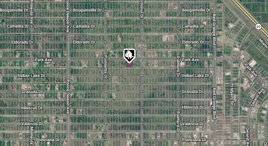 Photo of 209 Park Avenue, Indian Lake Estates, FL 33855 (MLS # O6432740)