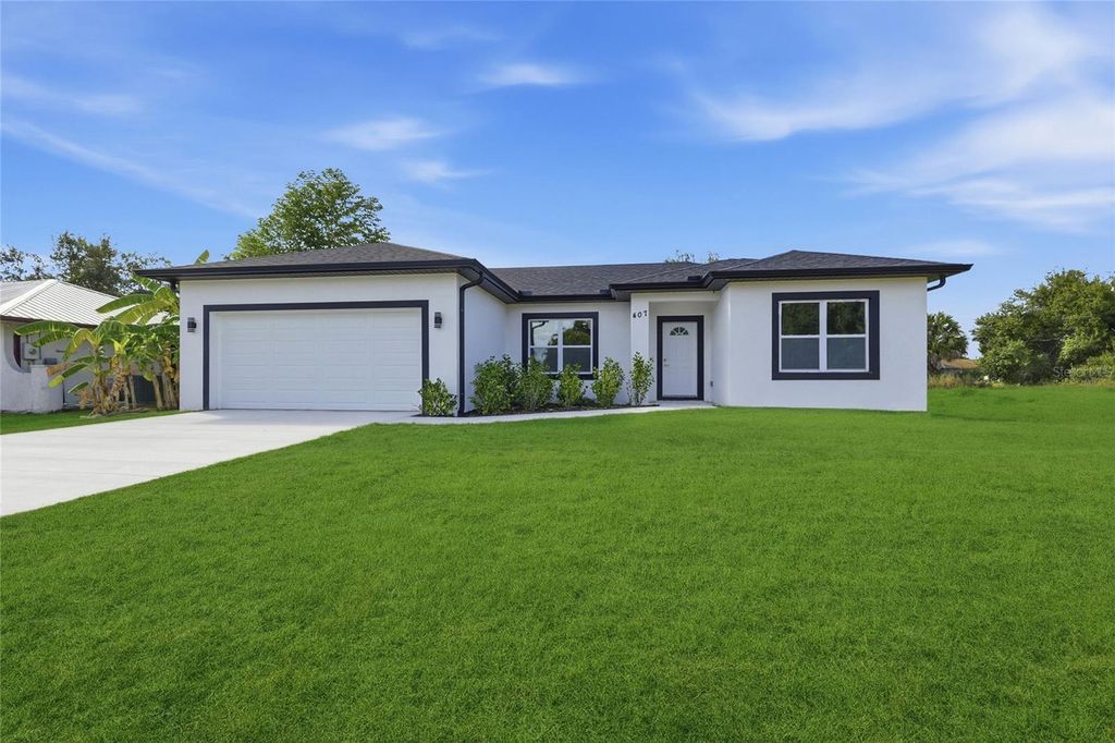 Photo of 407 Harbor Boulevard, Port Charlotte, FL 33954 (MLS # TB8463232)