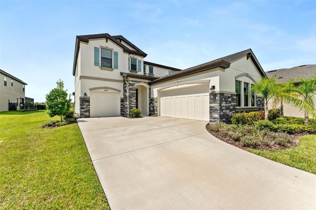 Photo of 14885 Paddock Pond Avenue, Lithia, FL 33547 (MLS # TB8414153)