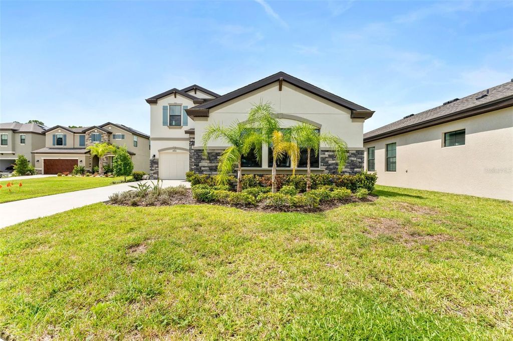 Photo of 14885 Paddock Pond Avenue, Lithia, FL 33547 (MLS # TB8414153)