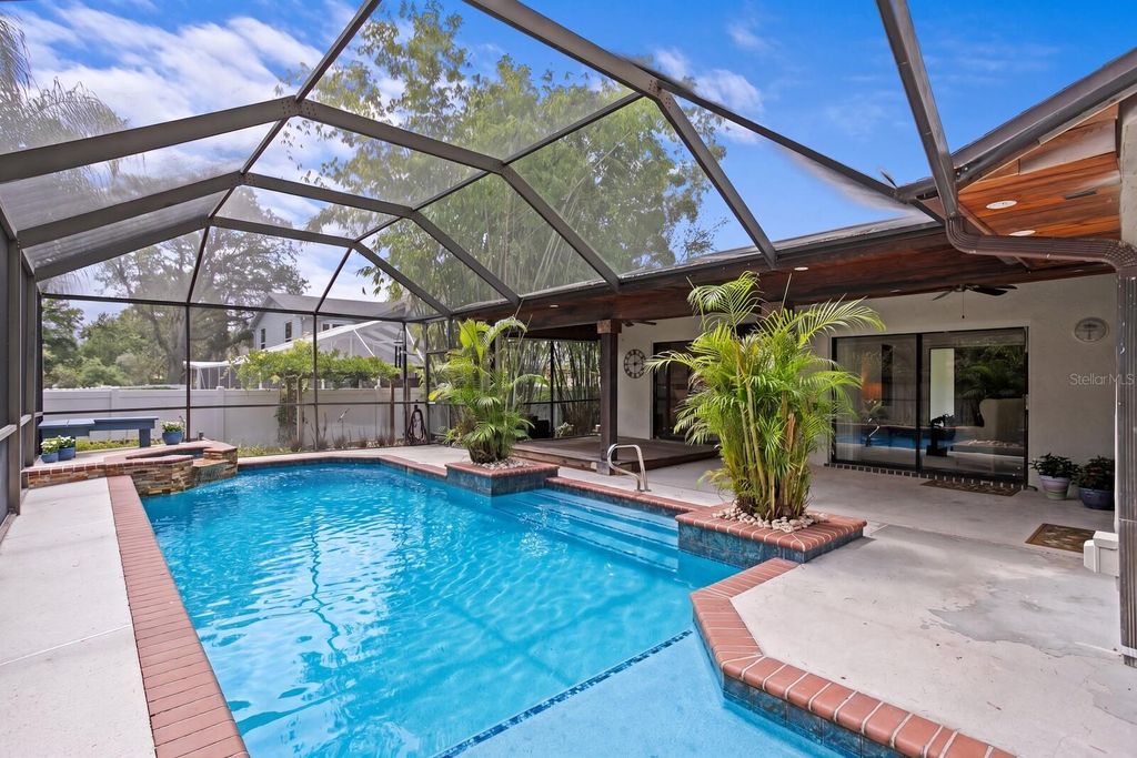 Photo of 6314 E 112th Avenue, Tampa, FL 33617 (MLS # TB8513090)