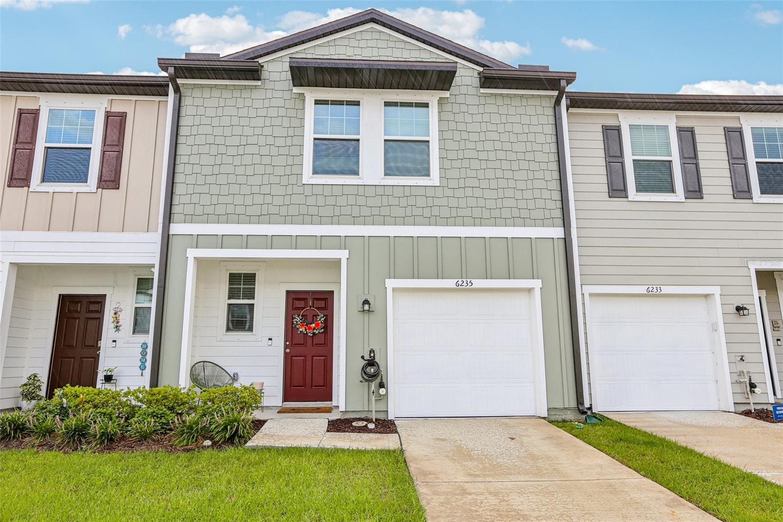 Welcome home to 6235 Bucket Court, a charming and meticulously maintained townhouse built in 2023, offering modern living in a fantastic location! This new 3-bedroom, 2.5-bathroom residence boasts 1,421 square feet of thoughtfully designed living space, perfect for comfortable everyday life and entertaining.
Step inside to discover an open floor plan with soaring ceilings, creating an airy and inviting atmosphere. The well-appointed kitchen boasts beautiful stone countertops and brand-new stainless-steel appliances, making meal preparation a delight. The spacious primary bedroom provides a private retreat, complete with an oversized walk-in closet and an attached bathroom featuring beauful sink space and a convenient walk-in shower and tub combination. Two additional well-sized bedrooms and a full bathroom complete the upstairs, providing ample space for family or guests.
Enjoy the Florida lifestyle with a private patio, perfect for relaxing outdoors. The property also includes a convenient one-car parking space.
Located in a vibrant community, this home provides access to a playground, ensuring fun for all ages. With a low HOA fee's, you will enjoy a well-maintained community. This home is ideally situated, offering easy access to major roadways and putting you just minutes away from a variety of restaurants, grocery stores, and local attractions. Do not miss the opportunity to make this move-in-ready townhouse your own! Experience modern comforts and a fantastic community in this desirable Gibsonton location.