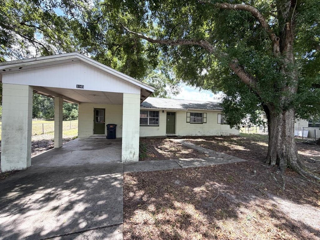 Photo of 3145 Fletcher Avenue, Lakeland, FL 33803 (MLS # A4699922)