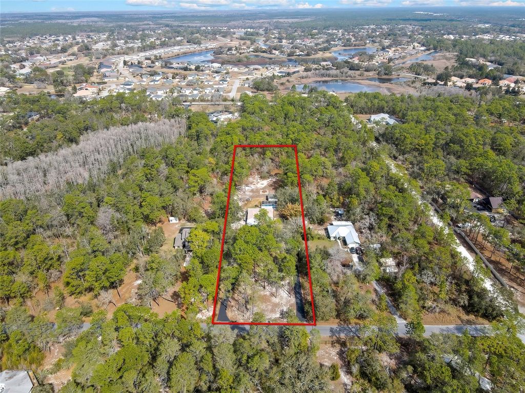 Photo of 9153 Michigan Avenue, Weeki Wachee, FL 34613 (MLS # TB8478381)