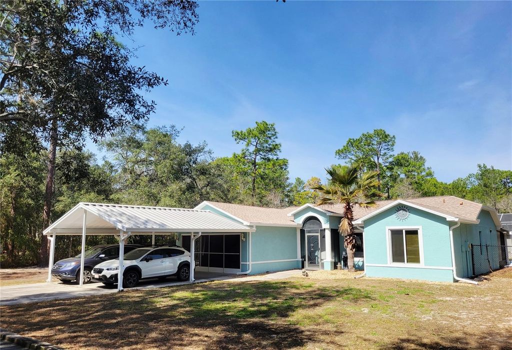 Photo of 9153 Michigan Avenue, Weeki Wachee, FL 34613 (MLS # TB8478381)
