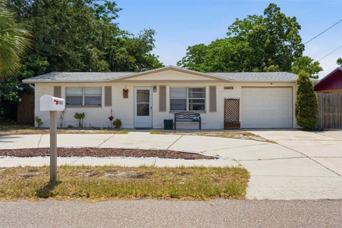 Photo of 11015 Tyler Drive, Port Richey, FL 34668 (MLS # W7886637)