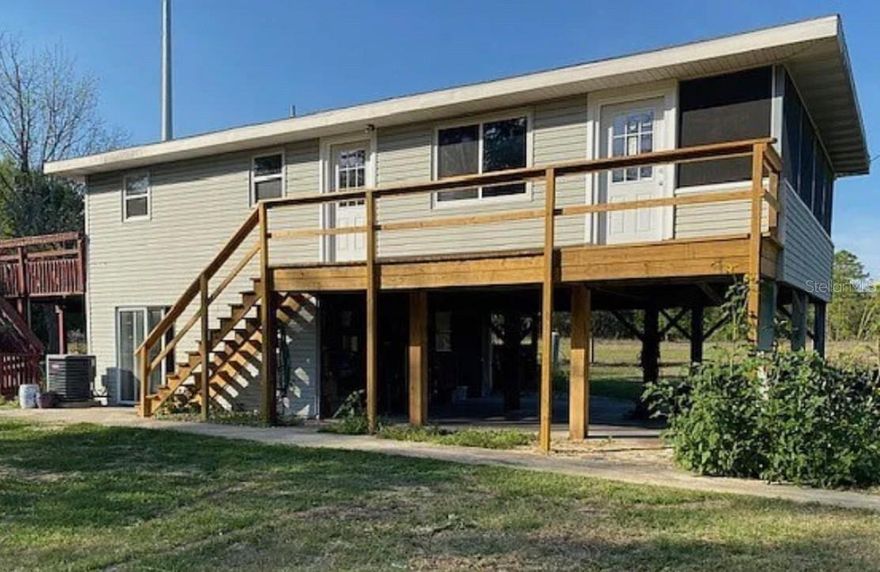 Pictures coming soon! Discover peaceful country living on this beautiful 9.62 acre property, perfectly set up for those who love space, privacy and room for animals. Fully fenced and thoughtfully laid out, the land features three pastures and a run-in shed ready for two horses, making it an ideal setup for equestrians or hobby farmers. The property includes a charming 2 bedroom, 1 bath stilt home that offers elevated views and a breezy, open feel. Beneath the house is a spacious area with ample room to expand, giving you the opportunity to create additional living space, storage, or a workshop - whatever fits your vision. With a wood-burning fireplace, newer deck and fresh interior paint, this home is move-in ready. Whether you're looking for your own mini farm, a peaceful retreat or a property with room to grow, this unique acreage provides endless potential. Enjoy the freedom, the space, and the possibilities that come with true country living: roof 2018, AC 2019.