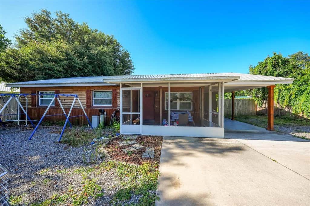 Photo of 715 4th Street, Polk City, FL 33868 (MLS # O6414801)