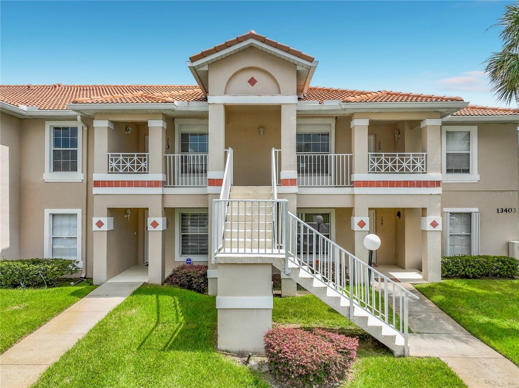 Photo of 13403 Fairway Glen Drive #104, Orlando, FL 32824 (MLS # O6443489)