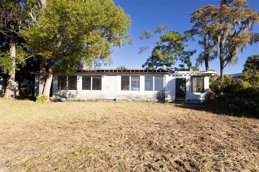 Presenting a rare lakefront opportunity with a private dock on a peaceful, small lake in the heart of Orlando. This unique property sits on an oversized .79-acre lot, offering incredible potential for redevelopment. The value is in the land, as the two existing structures are in teardown condition, making this an ideal site for new construction or multi-family development.  Tucked away from the road for added privacy, the setting feels quiet and secluded while still being close to everything. With R-3 zoning and no HOA, the property provides flexibility for builders, investors, or buyers looking to create something special. The lakefront location adds long-term appeal and makes this a standout opportunity compared to typical infill lots.  Conveniently located near major highways, including the Florida Turnpike, I-4, and 528, with easy access to Orlando International Airport, Disney, Downtown Orlando, and all the attractions, dining, and entertainment the City Beautiful has to offer.  The property is being sold As-Is, with no repairs or warranties from the seller. Buyers are responsible for all due diligence related to zoning, development potential, utilities, and property condition. Whether you’re an investor, builder, or someone dreaming of a custom lakefront home, this is a property worth serious consideration.  Call today for additional details.