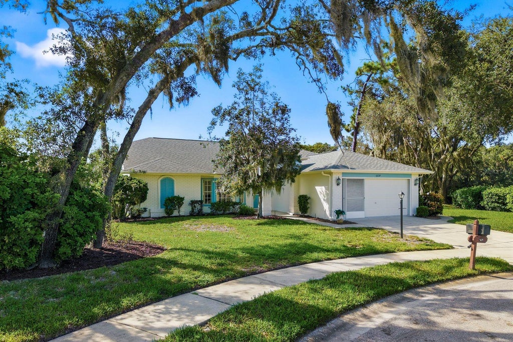 Photo of 6639 Sun Point Court, New Port Richey, FL 34655 (MLS # TB8528010)
