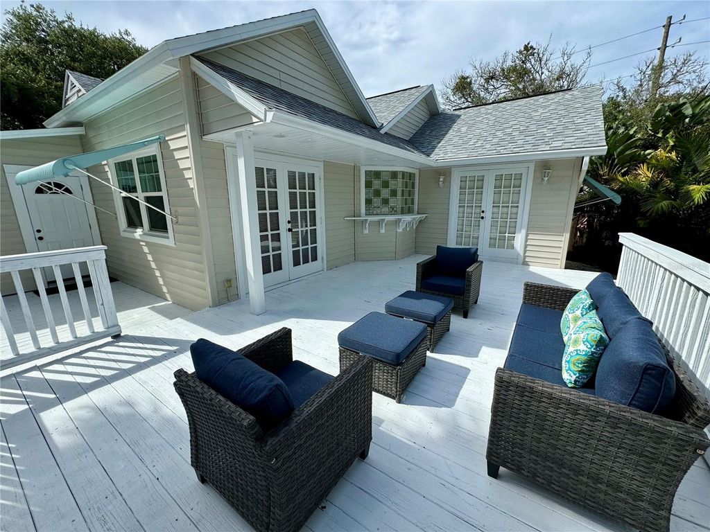 Photo of 109 N Peninsula Avenue, New Smyrna Beach, FL 32169 (MLS # O6405898)