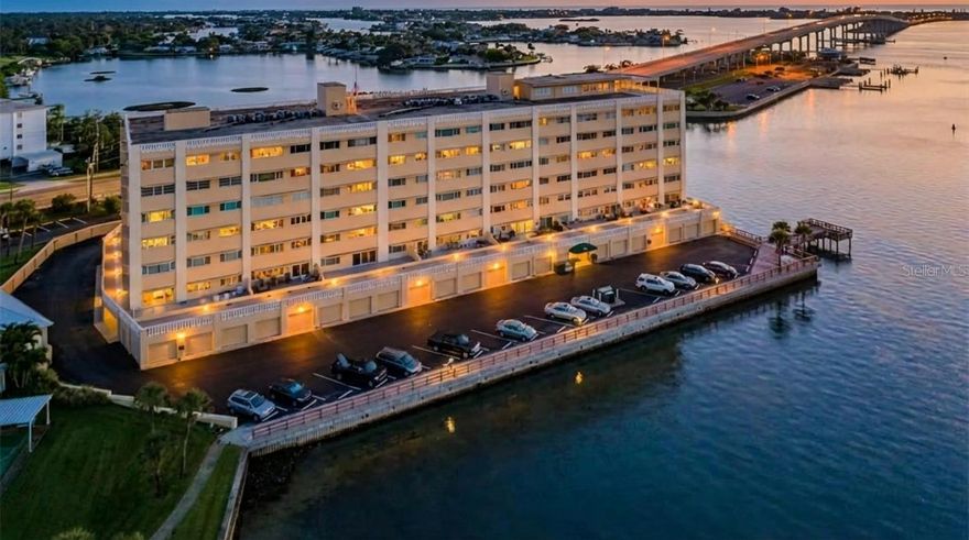 A well-constructed and maintained Condo Building with Strong Financials, Great Management, and Beautiful Water Views in Million Dollar neighborhood and reasonable HOA fees while fully funded and building  FLOOD INSURANCE is INCLUDED in your HOA . The highly regarded Harbour Club C offers peace of mind and long-term value.
This spacious CORNER END UNIT that is 2-bedroom, 2-bath that  is move-in ready with no storm damage and new hurricane-rated windows. Enjoy beautiful water views of the Clearwater Bay from nearly every room. The primary suite features a large walk-in closet and a recently renovated ensuite bathroom with a walk-in shower. The guest bedroom also enjoys expansive water views and generous closet space. . Recently installed custom window blinds were installed in all rooms.

The open expansive living area is filled with natural light and features plush carpeting and custom electric  window blinds. The kitchen has a functional, classic layout with plenty of cabinet and counter space and pantry, and the separate dining room is enhanced by floor-to-ceiling mirrors and an elegant crystal chandelier.
Additional highlights include a 3-year-old A/C unit, well-maintained appliances, elevator access, under-building assigned parking, and a private storage unit.
Residents enjoy access to a heated pool, shuffleboard courts, a 50-ft dock, and a fishing pier—perfect for watching dolphins, manatees, and boats pass by.
Located just a short walk to beaches, shops, and restaurants, this condo offers a rare combination of location, lifestyle, and long-term value in a beautifully maintained community. Whether you're looking for a primary home, vacation spot, or investment, this condo offers great value, beautiful views, and the confidence of owning in a financially secure. Recent 2023–2024 building upgrades, including a new roof, fresh exterior paint, and updated, reflect the board’s commitment to long-term upkeep—all with FULLY FUNDED, reasonable HOA fees. The Milestone Inspection and Reserve Study has been completed, giving added peace of mind to owners and investors alike .A recent increase in availability reflects several original owners choosing to sell around the same time—not any building or HOA concerns—creating a rare opportunity to purchase in this tightly held waterfront community. Recent building upgrades further enhance its appeal and stability. Priced with room to update with buyer personal style. Schedule a showing today to experience it for yourself.