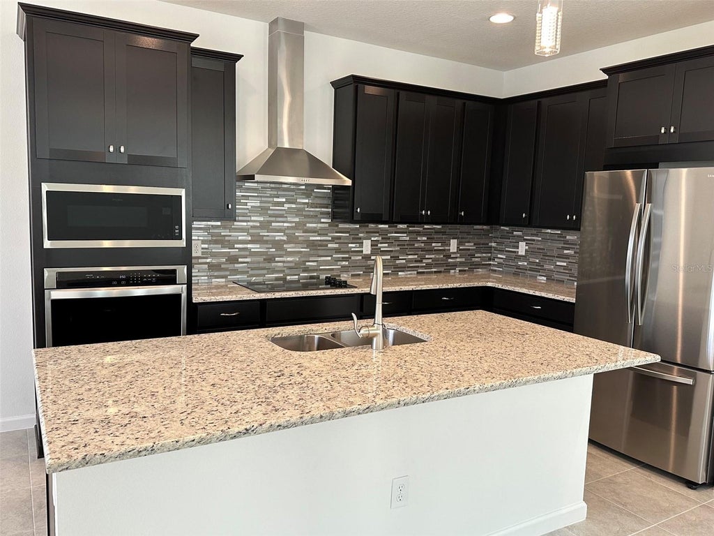 Photo of 5043 Lake Hamlin Trail, Winter Garden, FL 34787 (MLS # O6426255)
