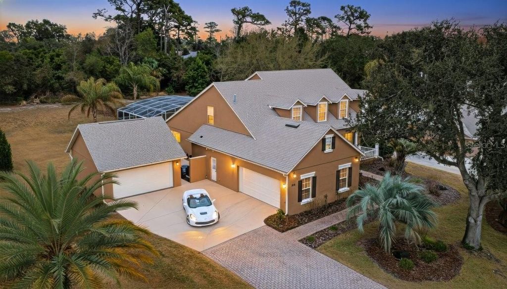 Photo of 341 Glen Club Drive, Debary, FL 32713 (MLS # V4947556)