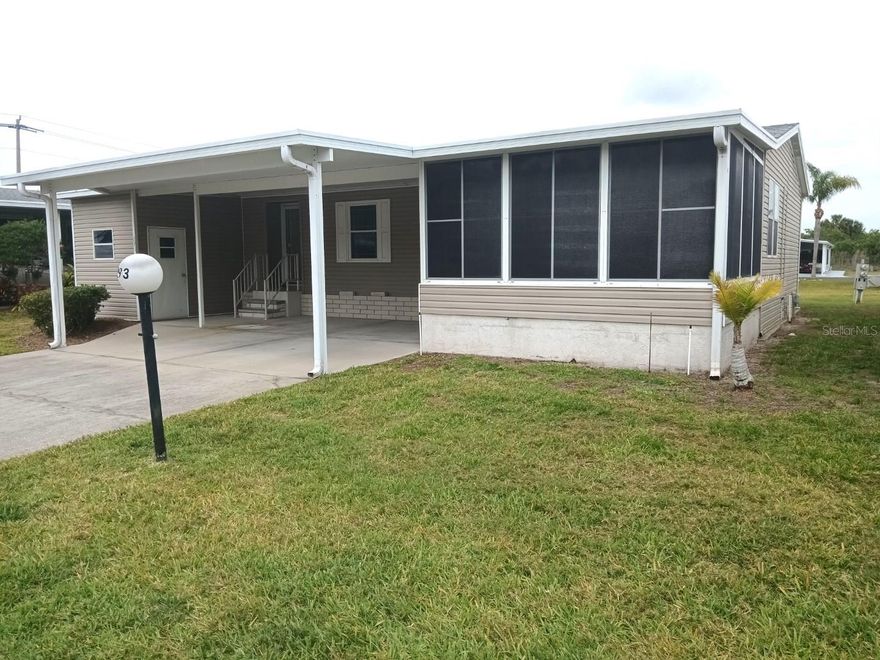 Spacious home located in the highly desirable gated GOLD TREE CO-OP; an active, vibrant 55+ community. Pets are welcome, rentals allowed, and lawn care is taken care of for you with low HOA fee! This well-taken care of home features asplit floorplan and vaulted ceilings with tons of windows bringing in plenty of daylight. A perfect home for entertaining, the large kitchen features breakfast bar seating, tons of counter space and sliding door into the Florida--style lanai. There is and a laundry closet conveniently off to the side of the dining room, and an office space to the side of the kitchen. Plenty of storage inside the home, along with an attached shed for extra storage and a workbench. The carport has two parking spots for your and your guest's convenience. Roof was updated in 2022 and HVAC in 2015. This wonderful community includes; pool/spa, fitness center, tennis and pickleball courts, shuffleboard, library, clubhouse, and many games such as ping pong and billiards. Great location to shopping, beaches and close- but not too close to the Sarasota/Bradenton airport. Very reasonably priced home, come take a look!