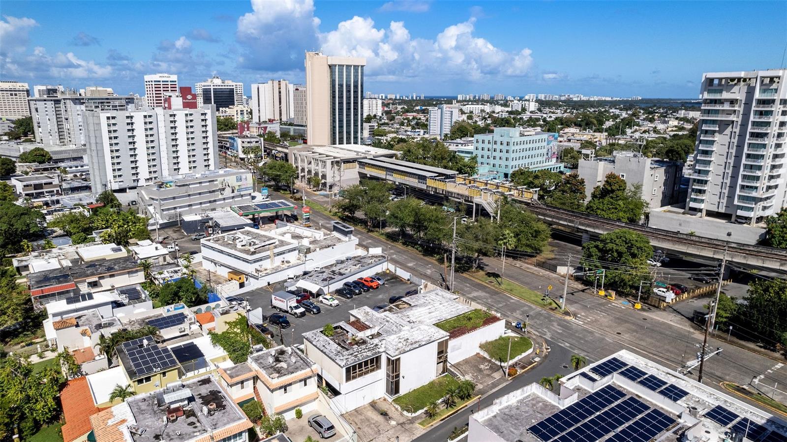 Located at No. 572 on the corner of Presidente Ramirez Street and Muñoz Rivera Avenue in the vibrant Baldrich Development of Hato Rey, San Juan, Puerto Rico, this commercial property presents an outstanding investment opportunity. Strategically positioned, the site benefits from excellent visibility and steady traffic along Muñoz Rivera Avenue, enhancing its accessibility and appeal for commercial use.
This 5,878-square-foot building features a mostly reinforced concrete structure with two stories, comprising a ground floor area of 4,267 square feet and a second level of 1,611 square feet. Ample parking is provided with five exterior surface spaces and a 728-square-foot carport accommodating an additional 4 to 5 stalls, including back-to-back parking, for a total capacity of approximately 10 vehicles.
The 921.75 square meter lot enjoys a unique trapezoidal shape on a corner site, with C-2 commercial zoning in a minimal-floodable area (Advisory X), offering diverse redevelopment options.
The property’s highest and best use includes restoring it for commercial office purposes, or redeveloping the site for various commercial endeavors, such as fast food, retail, a showroom, car dealership, or carwash. Additionally, its strategic location and zoning make it a viable site for residential building development. Available for long-term lease or sale, this property stands as a versatile investment in Hato Rey, one of San Juan’s most active and accessible districts.