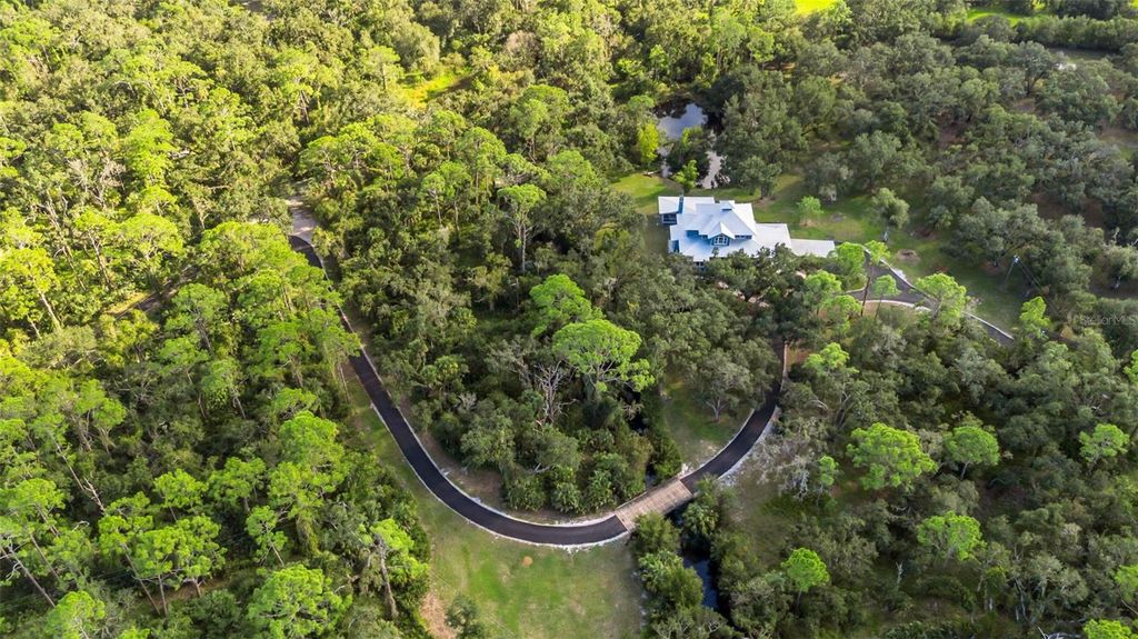 Photo of 14298 Mossy Oak Lane, Myakka City, FL 34251 (MLS # A4669291)