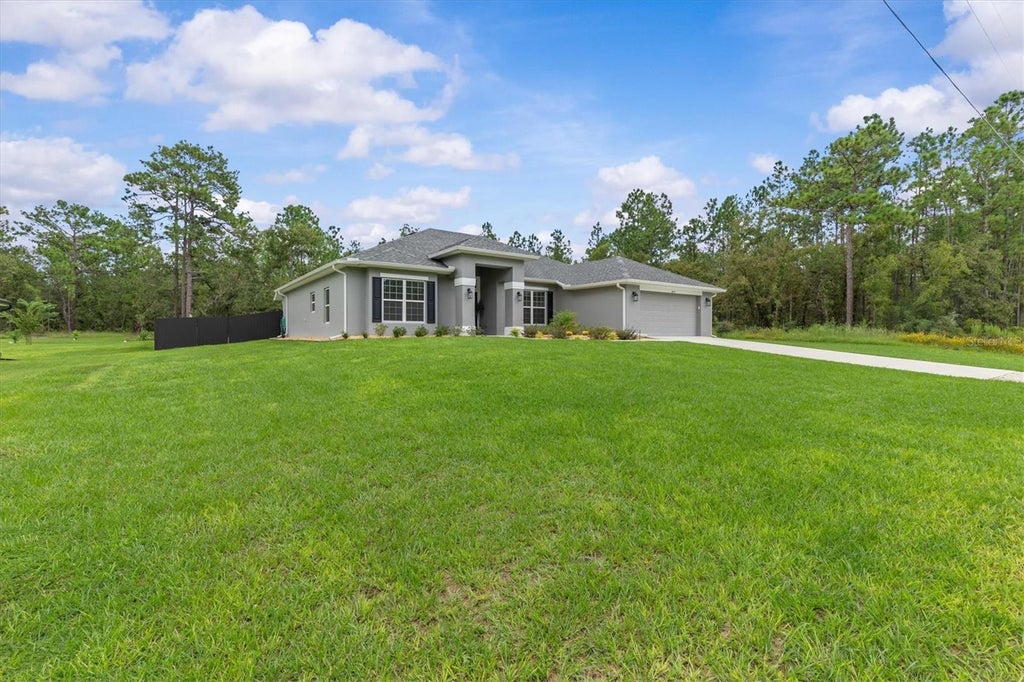 Photo of 16174 Malden Road, Weeki Wachee, FL 34614 (MLS # W7889409)