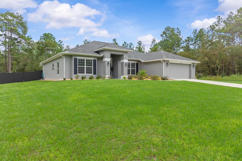 Photo of 16174 Malden Road, Weeki Wachee, FL 34614 (MLS # W7889409)