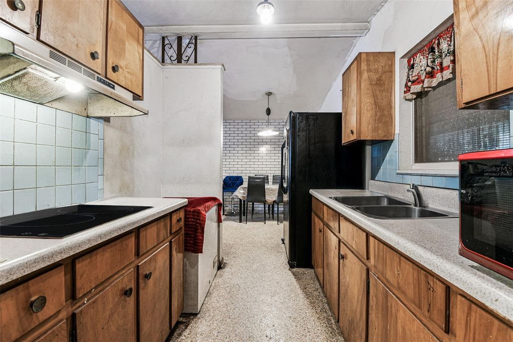 Photo of 7512 Rhode Island Drive, Tampa, FL 33619 (MLS # TB8427225)