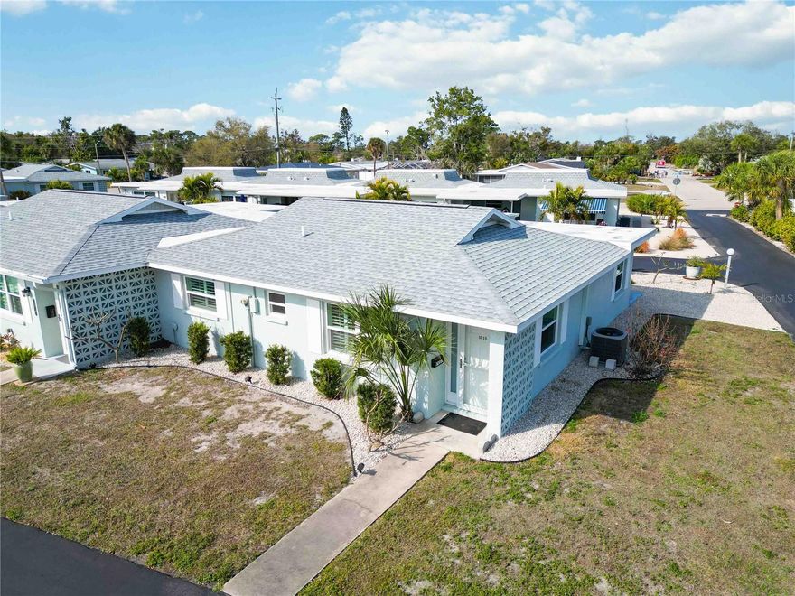 Location, Location, Location!!

0.8 miles to Service Beach, 1.2 miles to Sharky’s on the Pier, and 1.9 miles to downtown Venice, this move-in ready two-bedroom, one-and-a-half-bath villa is located on Venice Island west of Tamiami Trail. The home is single-level with no elevators or stairs to navigate.

This end-unit floor plan includes additional side windows that bring in natural light. Hurricane-impact windows are installed throughout, along with plantation shutters.

The kitchen was updated two years ago and includes soft-close French country cabinets and drawers, granite countertops, glass tile backsplash, stainless steel accents, GE stainless steel appliances, recessed lighting, and an under-sink reverse osmosis system.

Interior paint colors are neutral throughout the home. The primary bedroom includes a walk-in closet and an attached half bath. The full bathroom has a walk-in shower with new glass doors.

The layout provides two separate living areas. Tile flooring runs throughout the home, and ceiling fans are installed in each room.

Additional features include a separate laundry room and a carport with epoxy-coated flooring.

The property is located in a maintenance-free 55+ community that allows pets. Community amenities include a clubhouse with kitchen, seating area, restrooms, pool, shuffleboard courts, and a laundry facility.