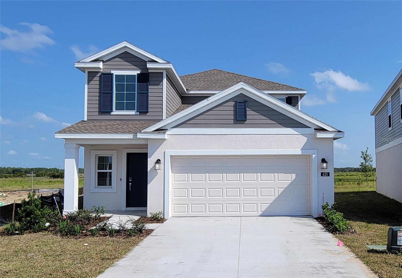 Almost New, Large 5-2.5 +loft home, Master bedroom and bath on 1st floor. See this great home in Astonia North, ready for immediate
occupancy. Open floor plan, Kitchen with quartz counters and breakfast bar island overlooks the large living/dining area with view out over the back patio. Tile throughout first floor, up to the Master Bedroom which has carpet. Large master bath with walk-in closet, dual sinks and walk in shower stall. Laundry room by 2 car garage, Half bath by stairs, top of the stairs has a large loft and Bedrooms 2, 3, 4, 5 upstairs. the shared hall bath has a double sink vanity split from the tub/shower and toilet for greater use. This plan from Lennar homes is very well laid out for the very efficient bedroom space. Floor Plan of this Columbia model on demand. Astonia North is a masterplan community of new single-family homes wrapped around a community of ponds and nature, A larger playground and community pool are on the other side of the community. Situated just a few miles South East of Champions gate in Davenport, FL. Located near shopping and dining at Posner Park. Close to I-4 with many theme parks and other restaurants and activities to enjoy nearby. Please email for more info or to set up a showing. all information is deemed reliable but not guaranteed