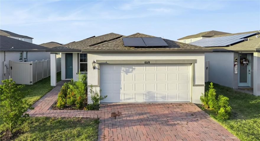 Short Sale. This move-in-ready 2024-built home in the growing Hammock Reserve community offers the perfect blend of modern design, comfort, and convenience — plus it qualifies for 100% USDA financing with no down payment for eligible buyers. Featuring 4 bedrooms and 2 bathrooms, this beautifully maintained single-story home showcases an open and functional layout ideal for both everyday living and entertaining.

From the moment you arrive, you’ll notice the attractive paver driveway and walkway leading to the covered front entry, adding great curb appeal. Inside, the spacious open-concept floor plan connects the living, dining, and kitchen areas seamlessly, creating a bright and welcoming atmosphere. Ceramic tile flooring throughout the main living spaces adds durability and style, while large sliding glass doors bring in natural light and lead to the backyard patio area — perfect for relaxing or weekend BBQs.

The kitchen is designed to impress with quartz countertops, stainless steel appliances, modern gray cabinetry, a large island with seating space, and a generous pantry for additional storage. The private primary suite offers a spacious retreat complete with dual sinks, a walk-in shower, and a large walk-in closet.

Three additional bedrooms provide flexibility for guests, family, or a home office setup and share a full secondary bathroom with a tub/shower combination. The interior laundry room includes extra storage space, making organization easy.

Residents of Hammock Reserve enjoy a low HOA along with community amenities, including a resort-style pool, playground, and dog park. Conveniently located near Highway 27 and I-4, the property offers quick access to Posner Park, Lake Eva Park, shopping, dining, medical facilities, Orlando attractions, and Tampa.

Why wait for new construction when you can own a nearly new home today? Schedule your private showing and see everything this home and community have to offer.