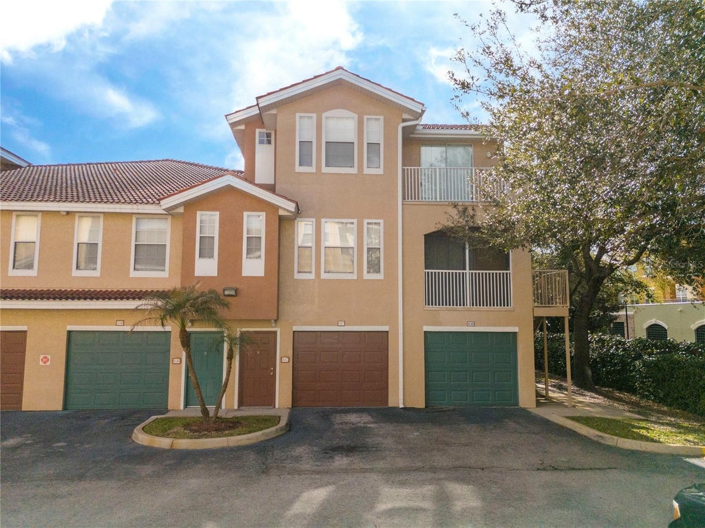Photo of 12102 Poppy Field Lane #107, Orlando, FL 32837 (MLS # O6419123)