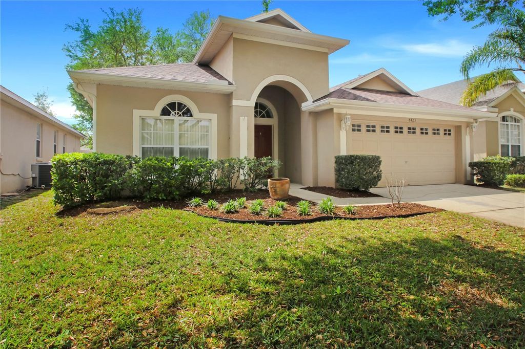 Photo of 8423 Baywood Vista Dr, Orlando, FL 32810 (MLS # O6395751)