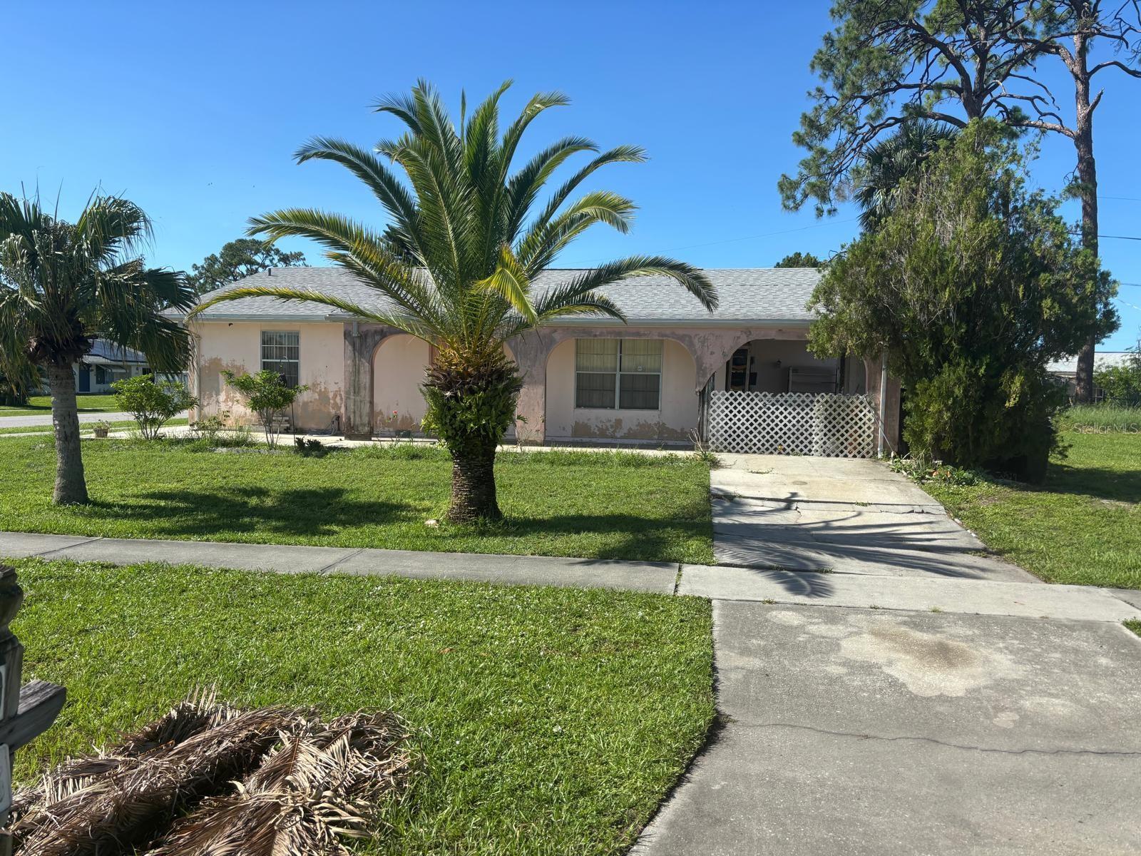 INVESTORS! CASH ONLY. Fixer-Upper. Roof is 2023, NOT in a flood zone, corner lot. Walking distance to Warm Mineral Springs. Near Interstate access and beaches. This home has a nice floor plan with a 2-bedroom, 2-bathroom. There is a covered lanai in the back. Buyers are encouraged to inspect prior to submitting offers. Sold strictly AS-IS. Perfect for fix and flip, rental buy and hold. Will not last.
