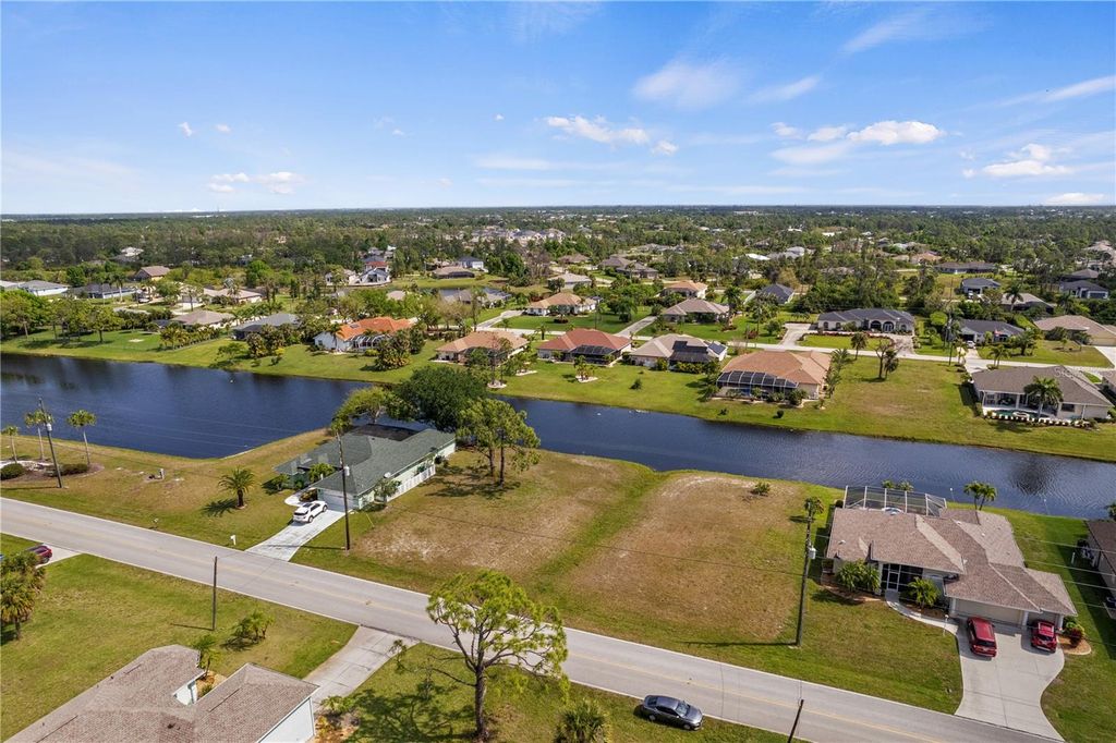 Photo of 805 Rotonda Circle, Rotonda West, FL 33947 (MLS # A4633244)