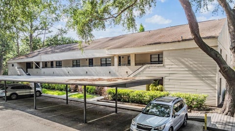 Photo of 4927 Puritan Circle #123, Tampa, FL 33617 (MLS # TB8524094)
