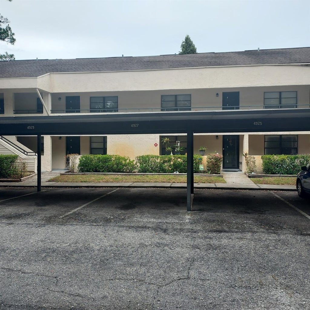 Photo of 4927 Puritan Circle #123, Tampa, FL 33617 (MLS # TB8524094)