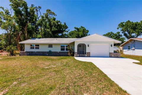 Photo of 1357 Nimrod Street, Port Charlotte, FL 33952 (MLS # C7507600)