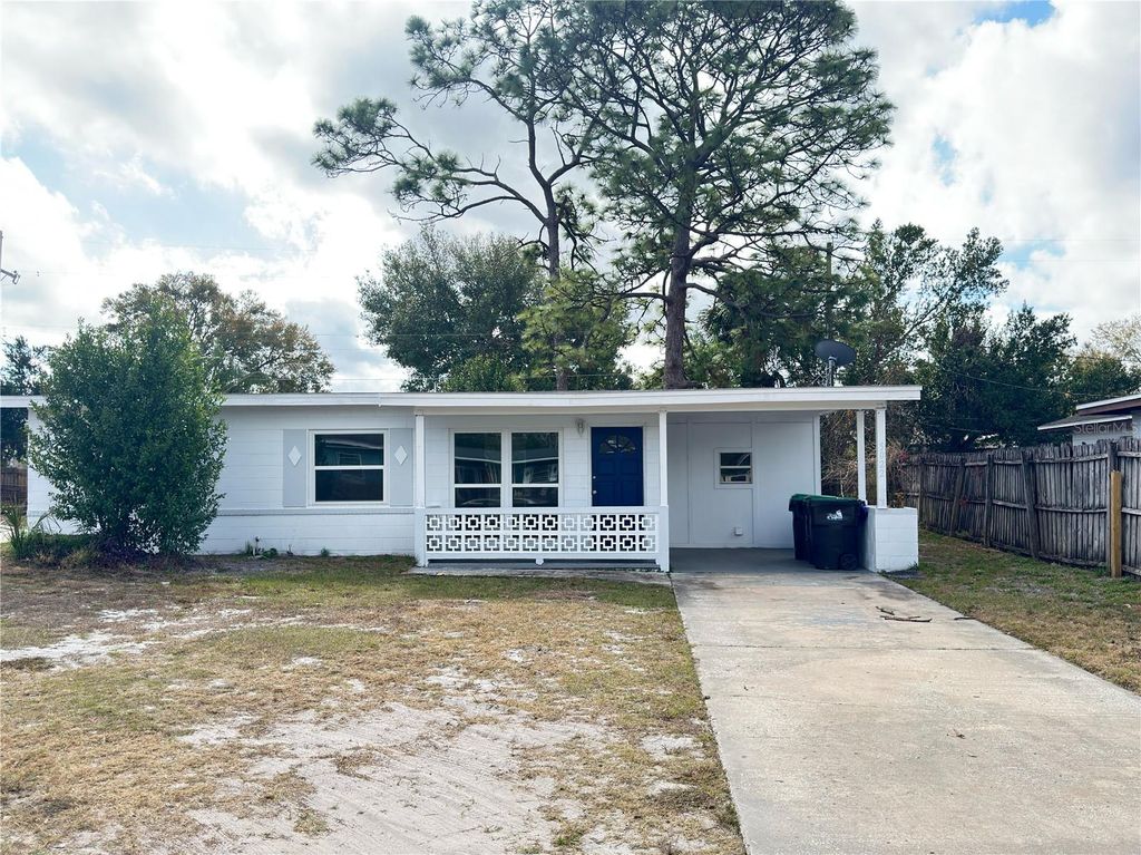 Photo of 5022 Keith Place, Orlando, FL 32808 (MLS # O6376811)