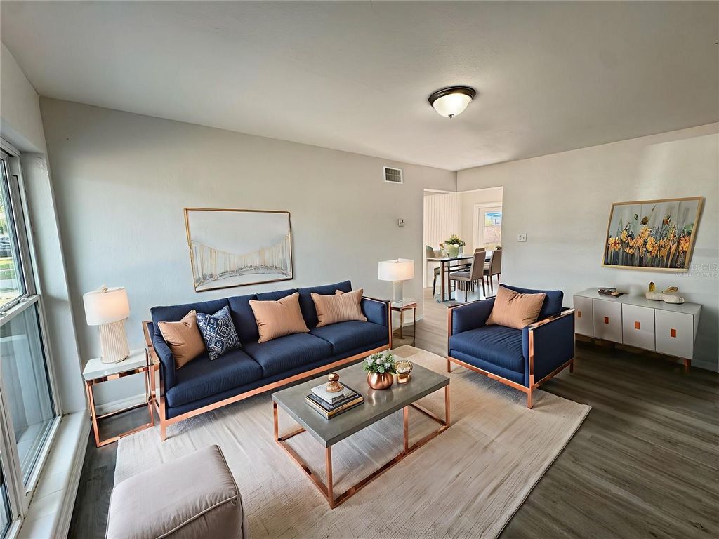 Photo of 5022 Keith Place, Orlando, FL 32808 (MLS # O6376811)